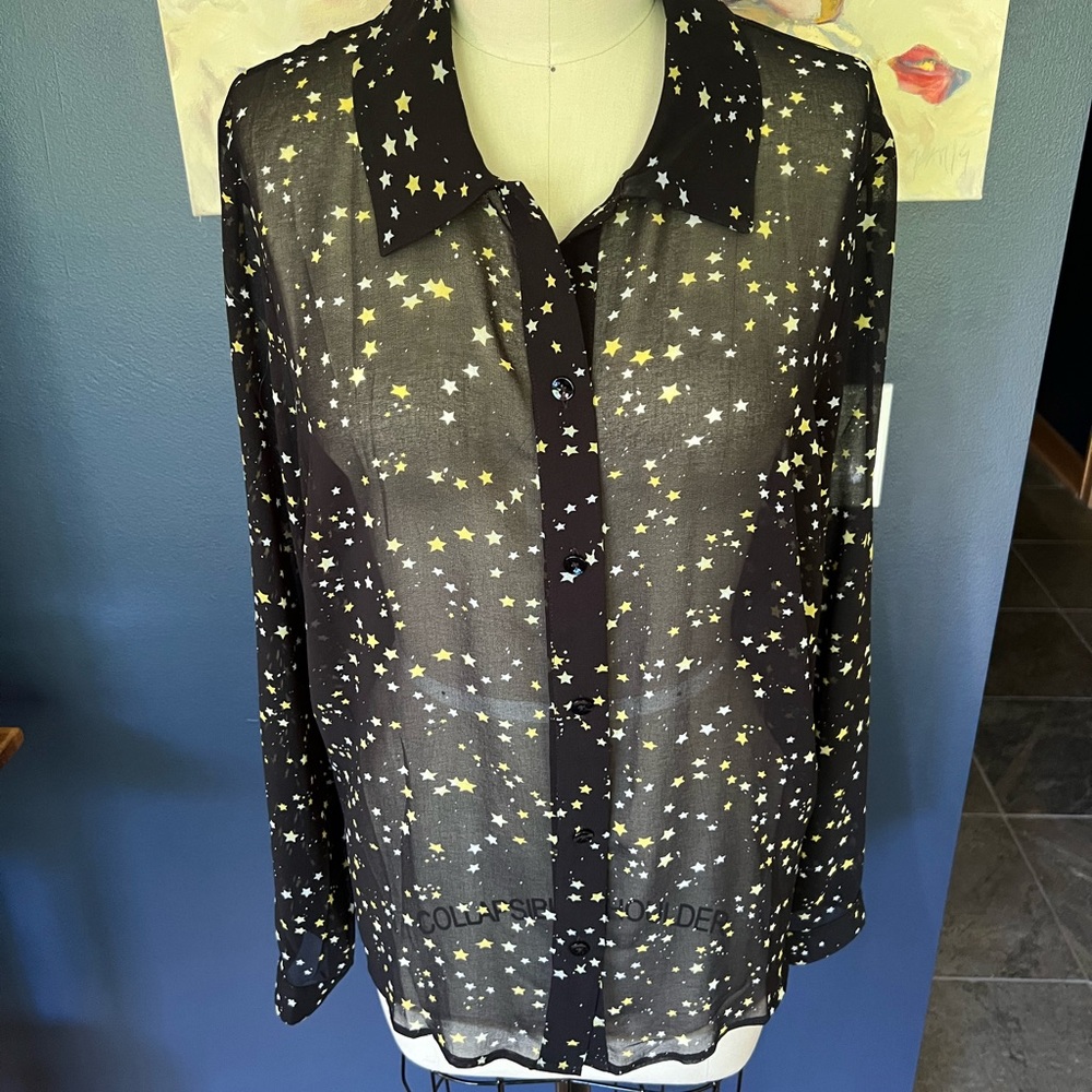 Women’s CAbi Galaxy Blouse size Large.  Sheer black button down with stars.